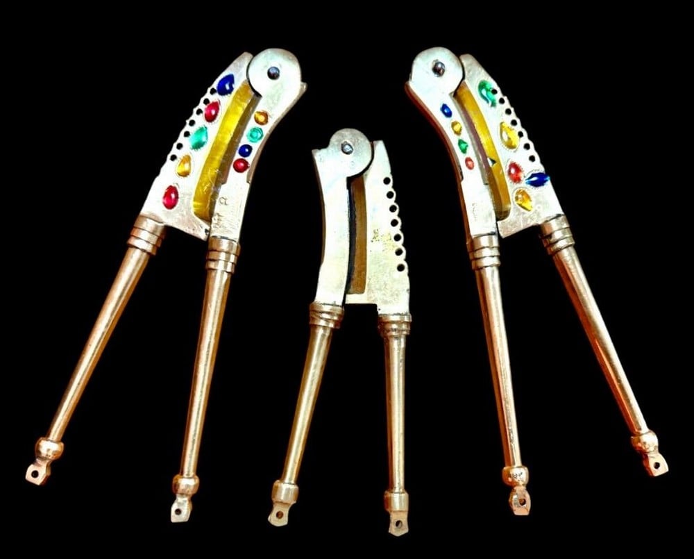 A Collection Of Handcrafted Brass Nutcrackers Decorated With Colorful Stones - 1