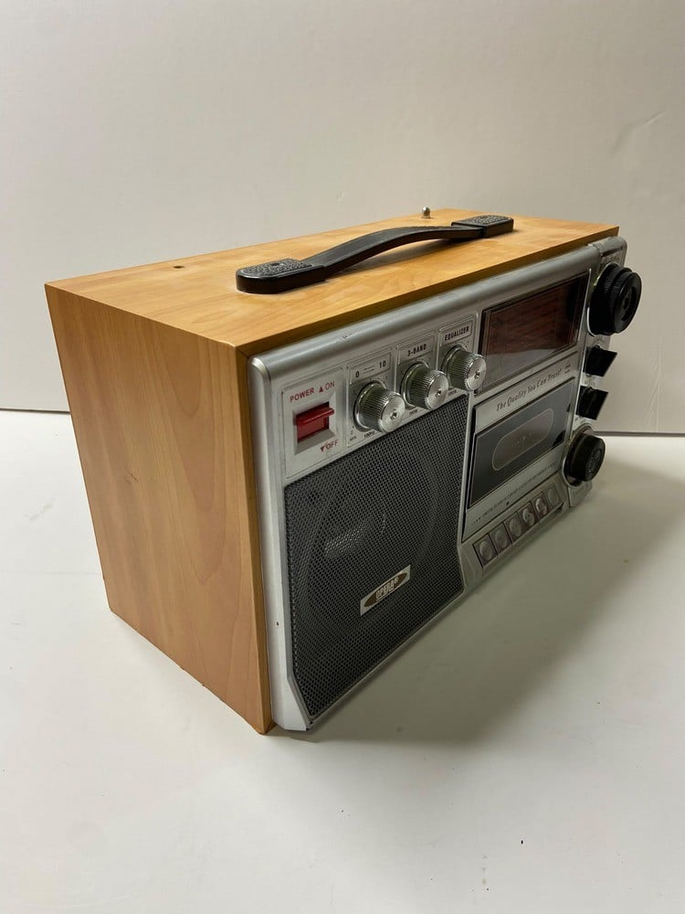 An Old Radio And Cassette Player With A Wooden And Silver Design - 4