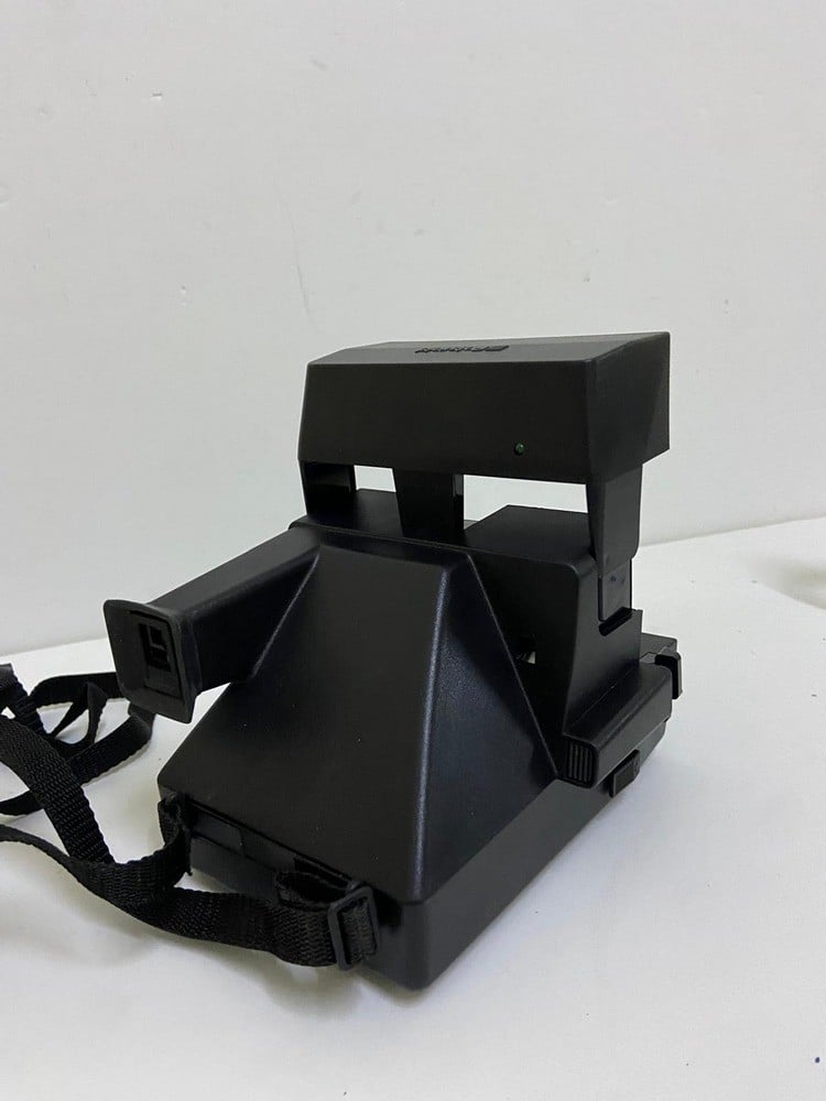 A classic instant camera, the Polaroid Supercolor 635 CL - 6
