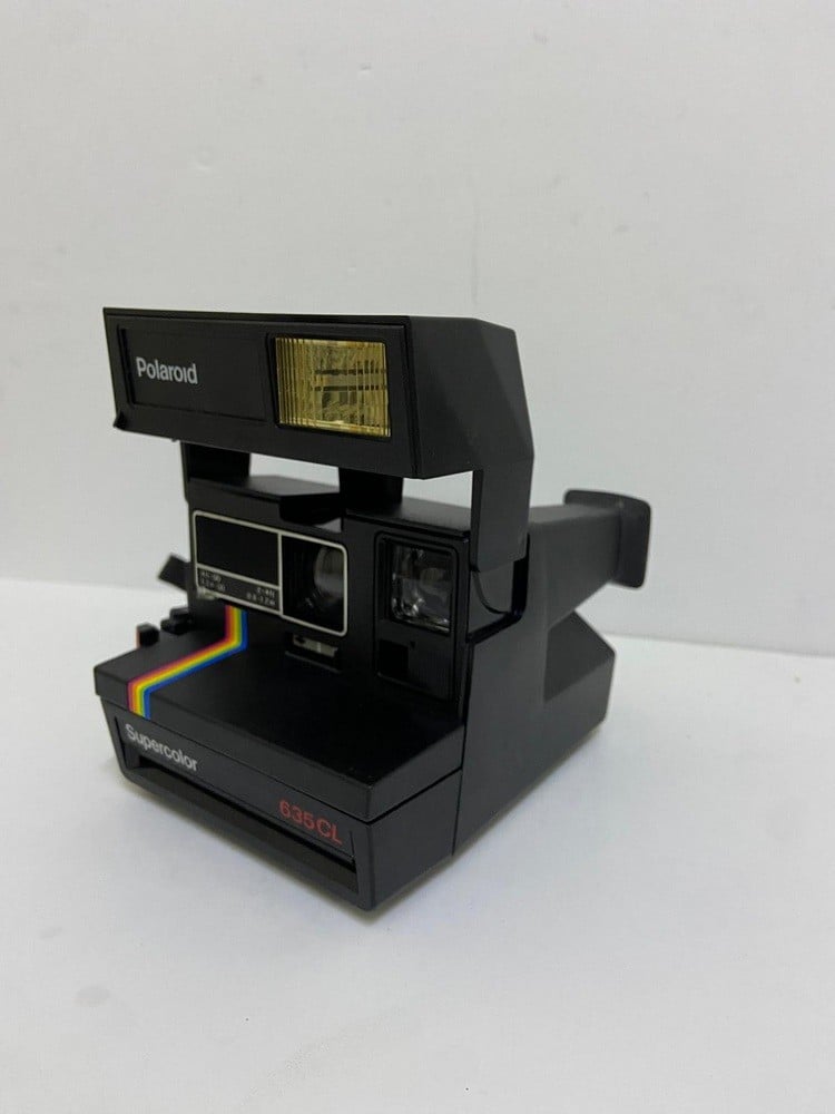 A classic instant camera, the Polaroid Supercolor 635 CL - 3