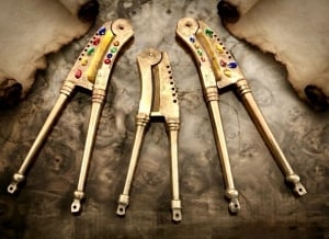 A Collection Of Handcrafted Brass Nutcrackers Decorated With Colorful Stones - 8