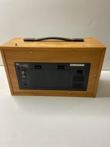 An Old Radio And Cassette Player With A Wooden And Silver Design - 5