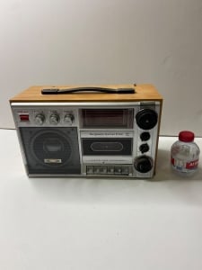 An Old Radio And Cassette Player With A Wooden And Silver Design - 2