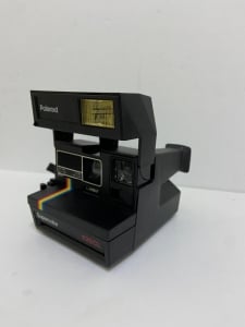 A classic instant camera, the Polaroid Supercolor 635 CL - 3
