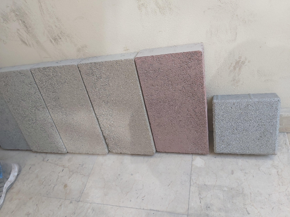 Interlock and kerbstoneby - 12