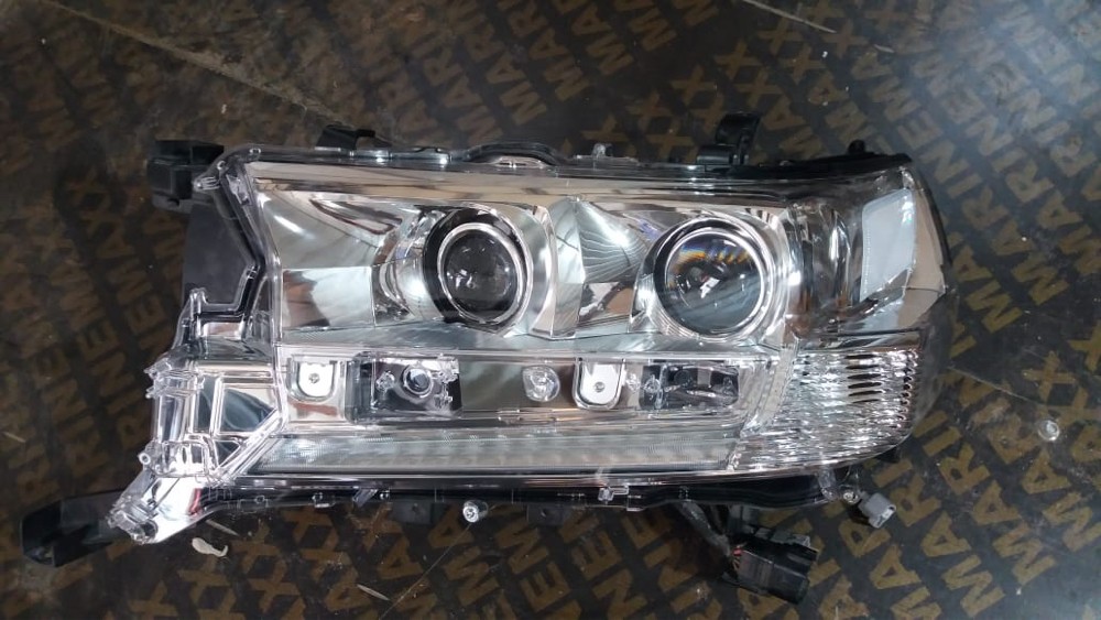 land cruiser headlight original - 1