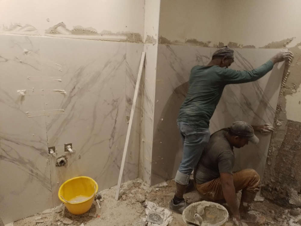 اعمال البناء طابوق بلاستر سرميك . - 12