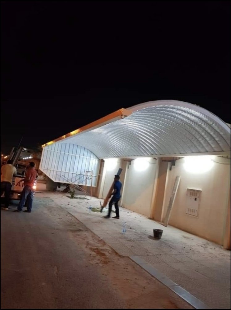 فني حدادة المظلات الكويكسبان-قماش - 5