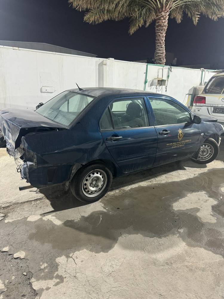 SCRAP MITSUBISHI LANCER - 1