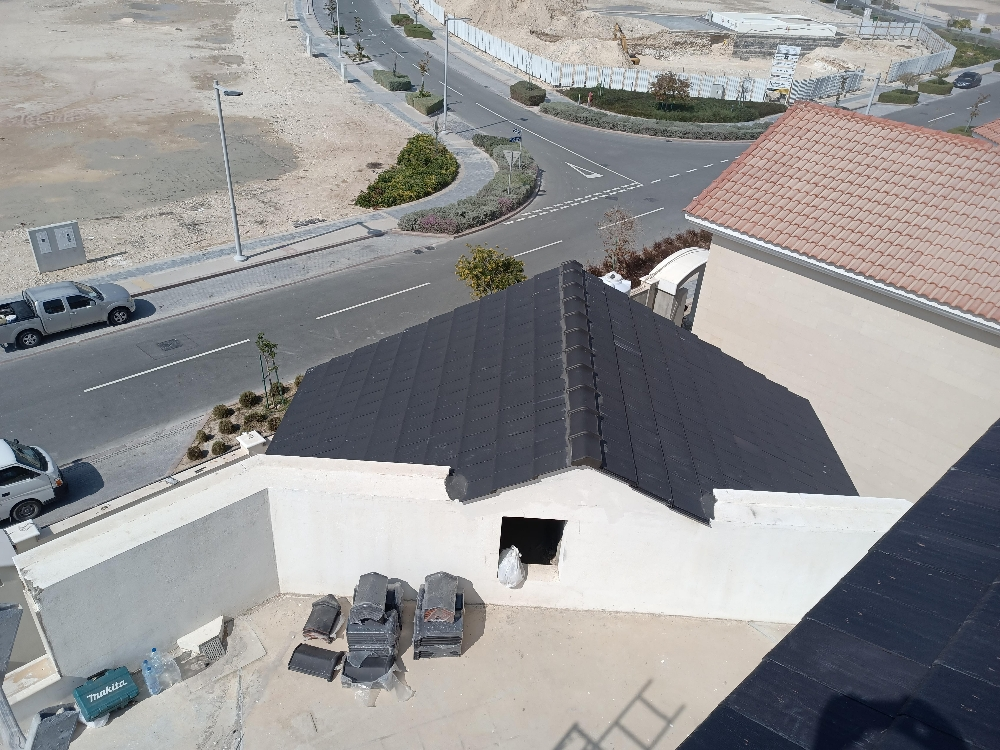 supply and fixing of Roof tiles . - 4