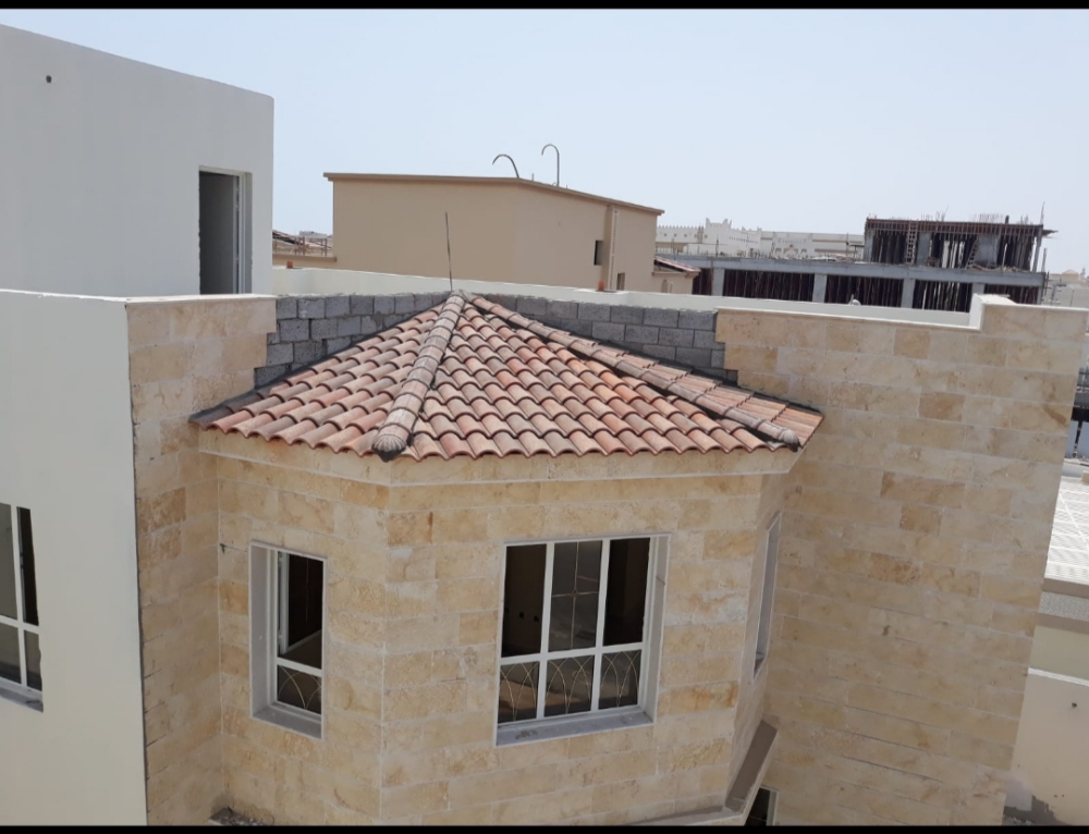 supply and fixing of Roof tiles . - 7