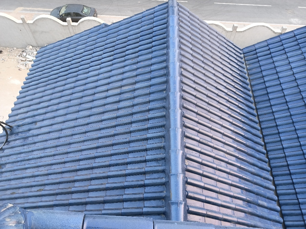 supply and fixing of Roof tiles . - 10