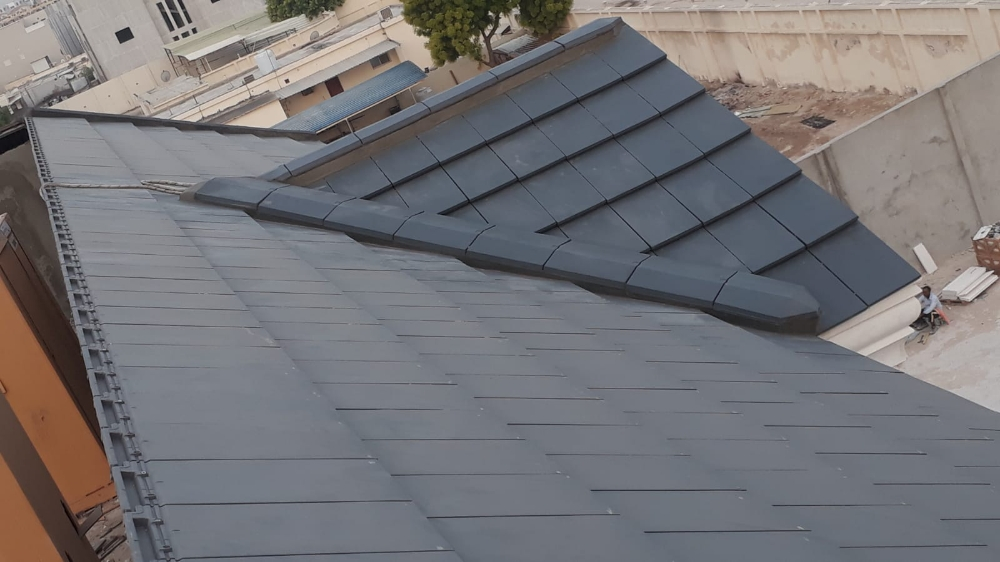 supply and fixing of Roof tiles . - 9