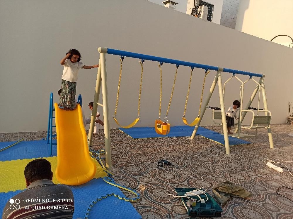 أرجوحة ومنزلقة للأطفال - 1