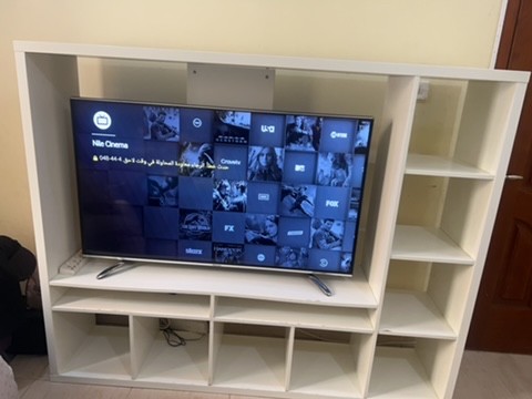 tv and bookshelf  - 1