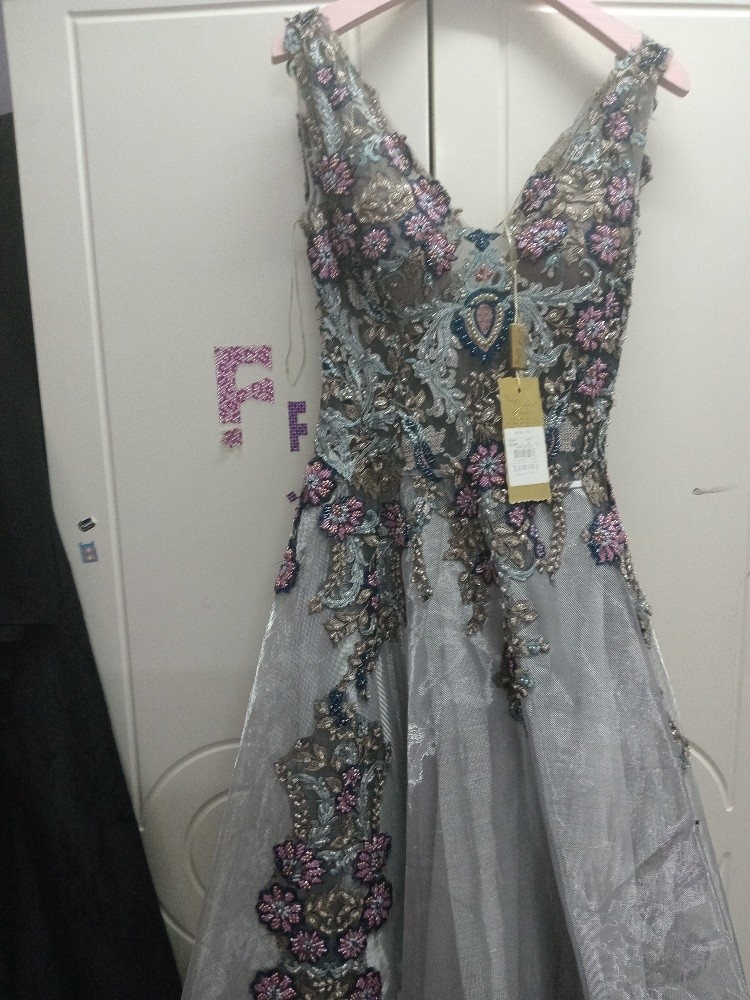 a lot of dresses different sizes - 1