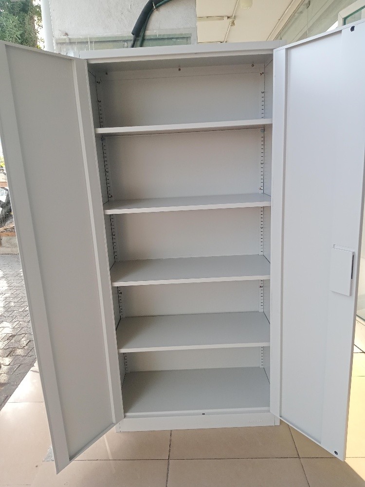 two door steel cabinet (new) - 1