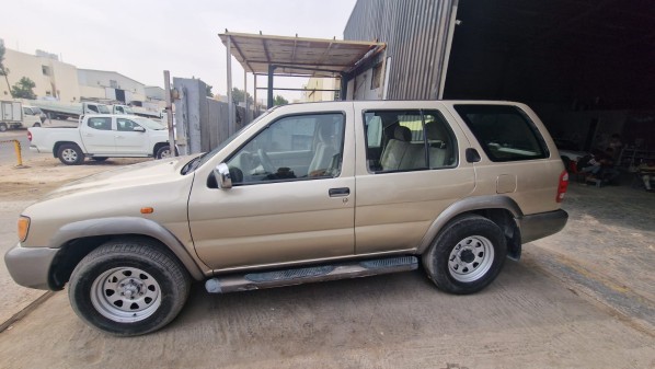 2003 Nissan Pathfinder Gold new - 1