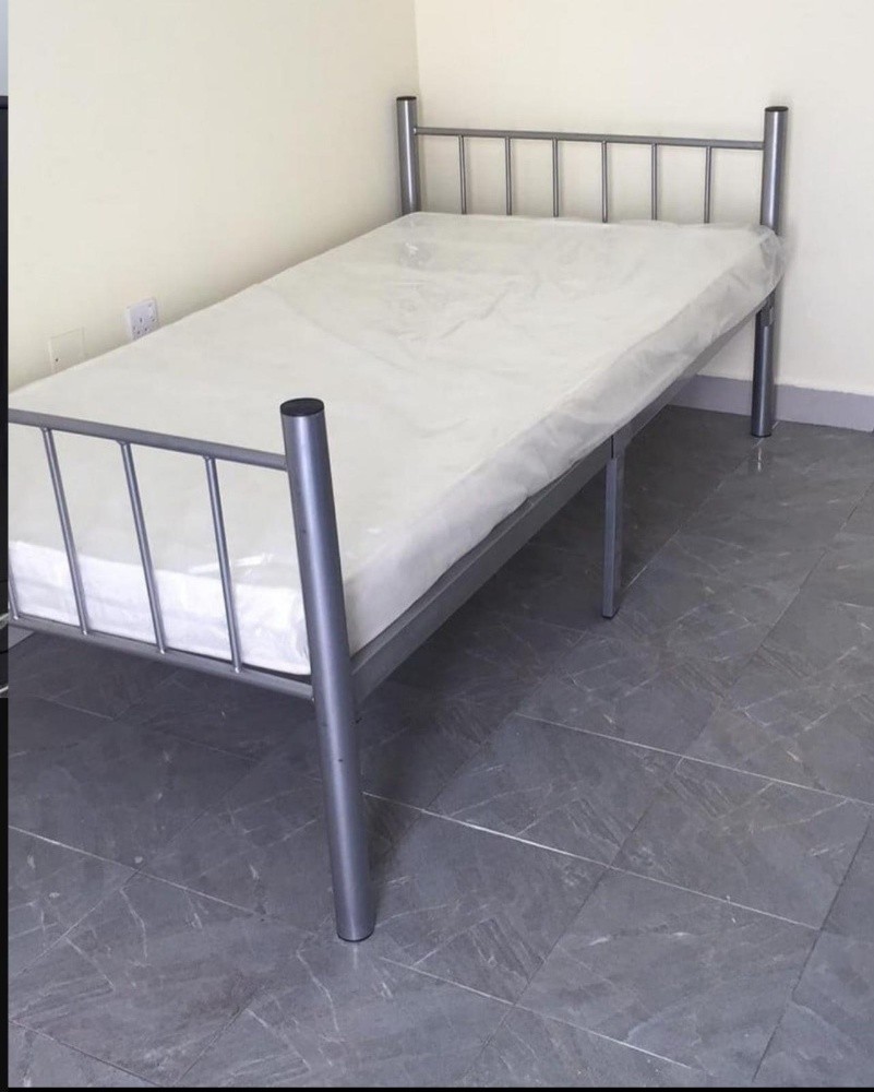 single metal bed with mattress., - 1