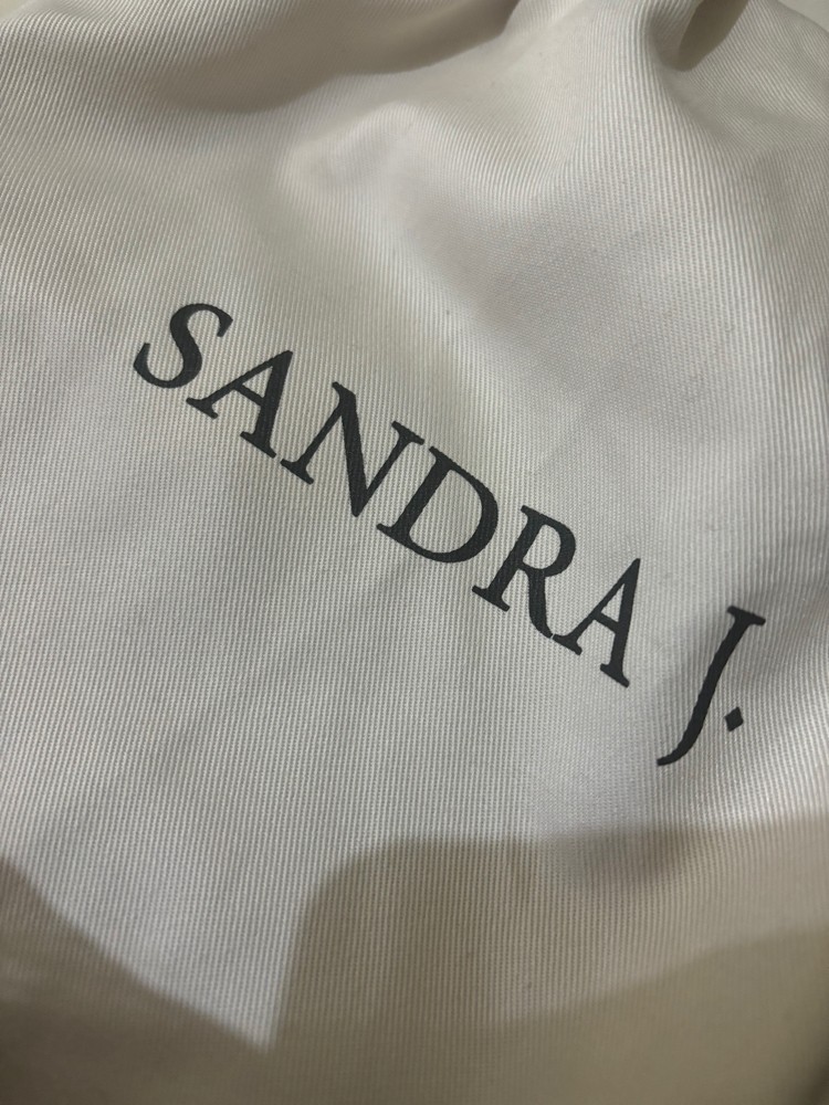 SANDRA J - 1