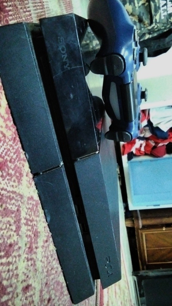 playstation 4 with a joystick. - 3
