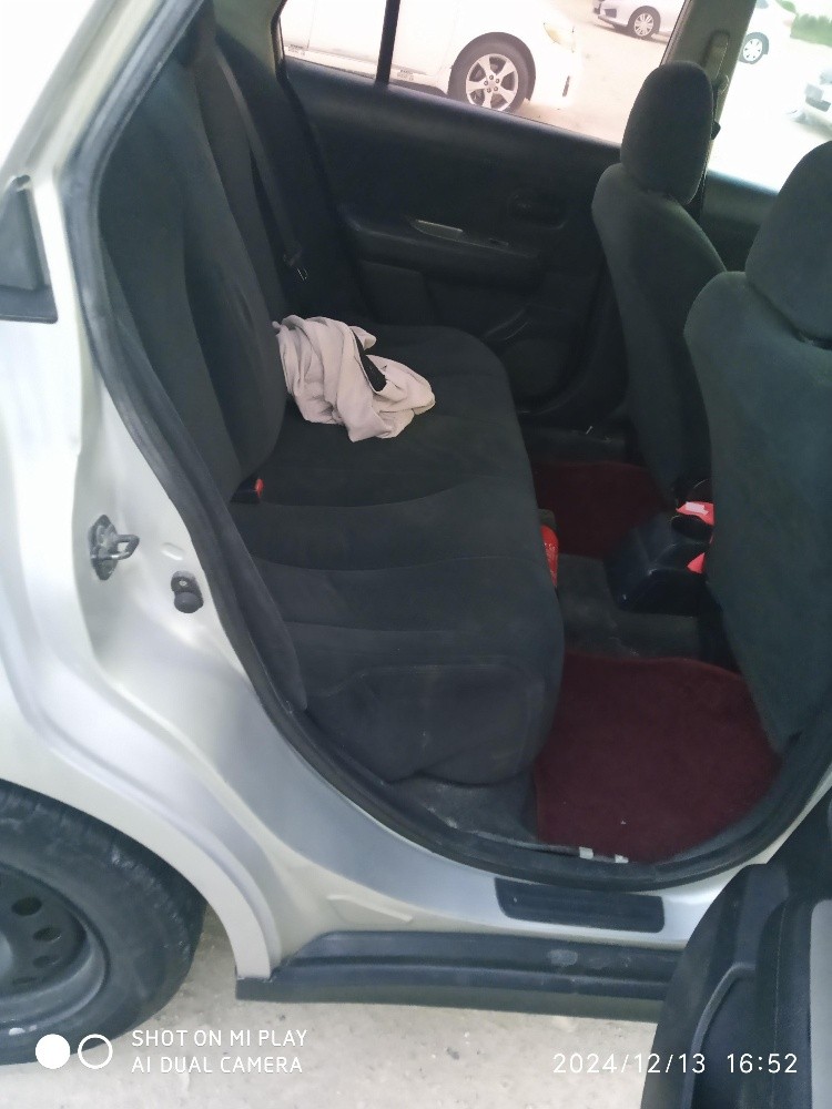 Nissan tida - 9