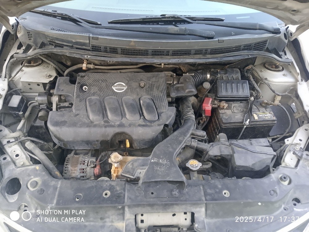 Nissan tida - 4