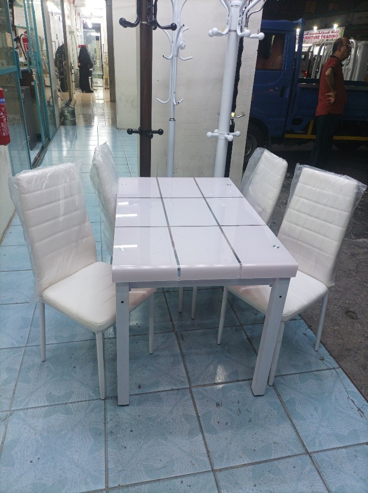 Dining table (brand new) - 9
