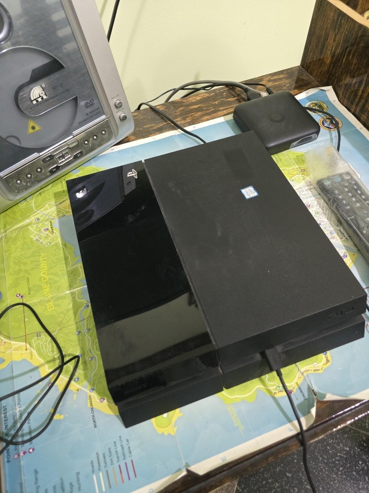 PS4 with 4 physical discs - 1