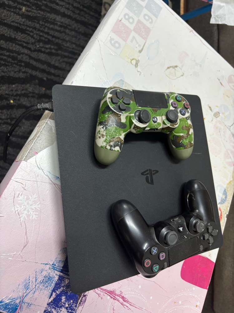 ps4 with 2 controllers  - 1