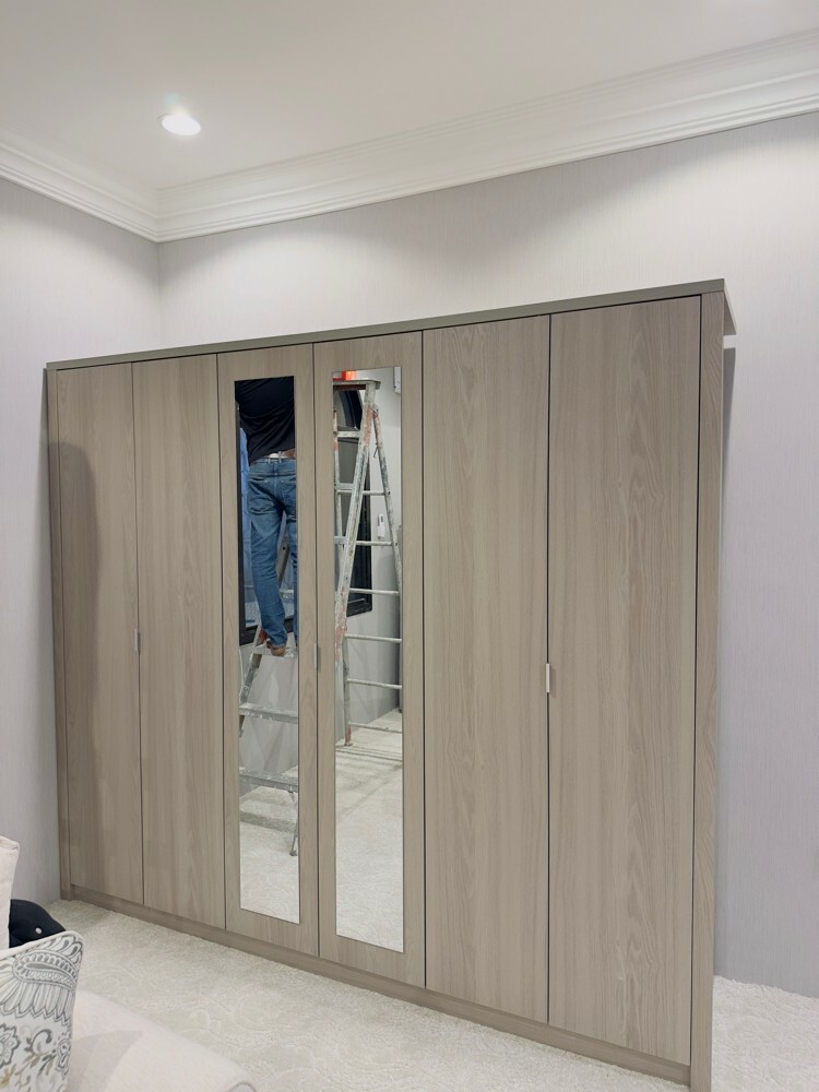 Makes New Cabinet Design - 1