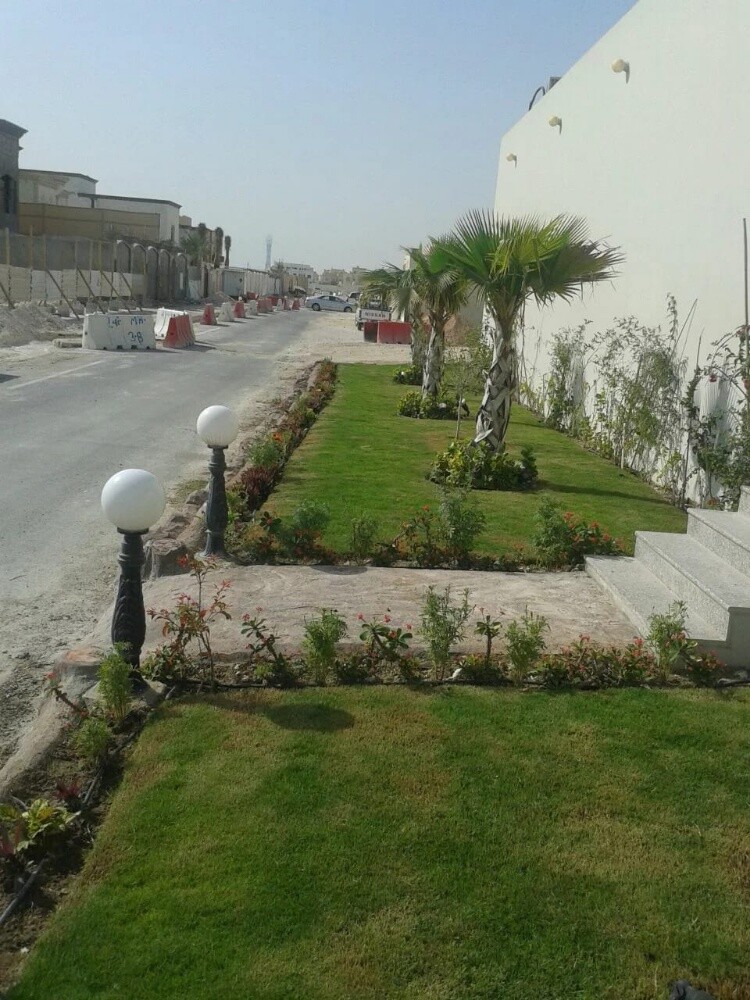 ترتيب الحدائق وقص العشب - 14