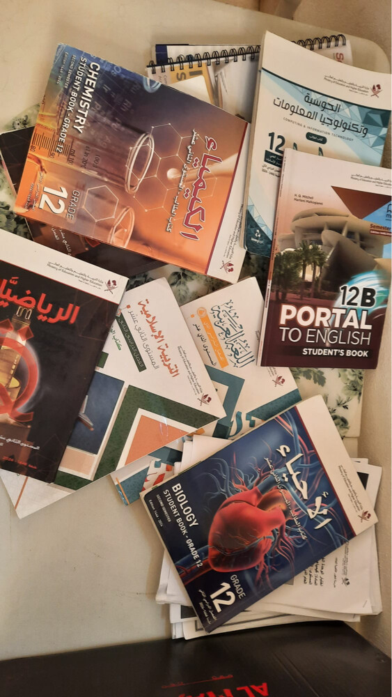 كتب صف 12 مدرسيه كلهم وملازم - 1