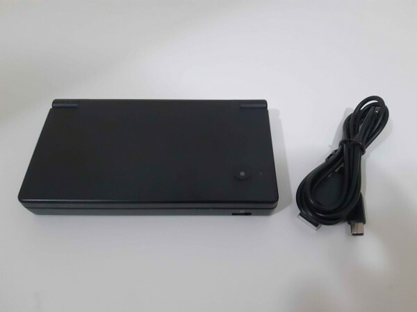 Black Nintendo DSi with charger - 1