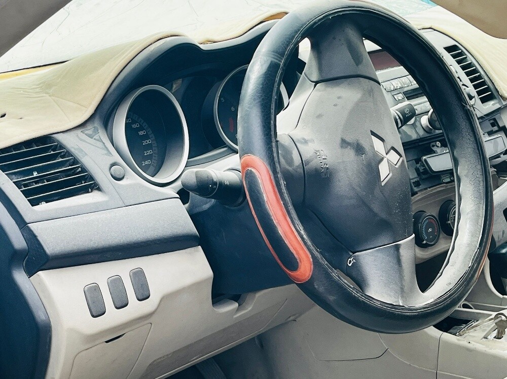 MITSUBISHI LANCER EX 2012 MODEL U — photo 6 for sale in Qatar