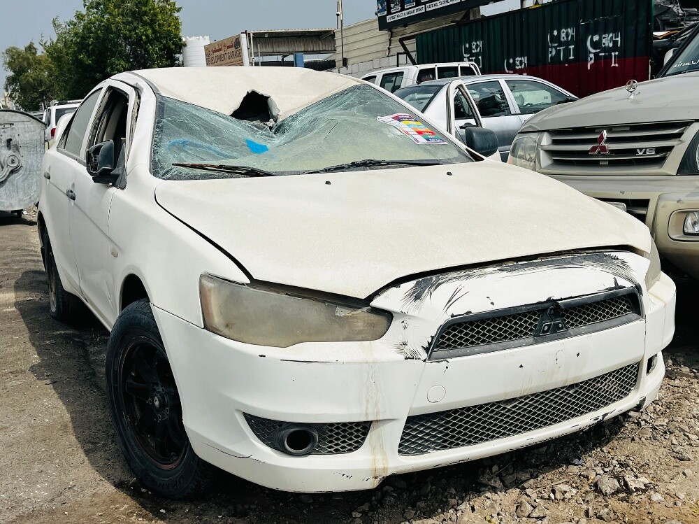 MITSUBISHI LANCER EX 2012 MODEL U — photo 4 for sale in Qatar