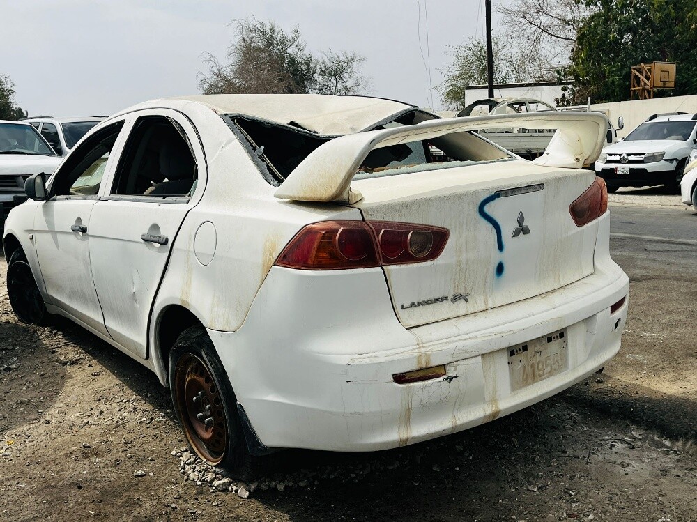 MITSUBISHI LANCER EX 2012 MODEL U — photo 3 for sale in Qatar