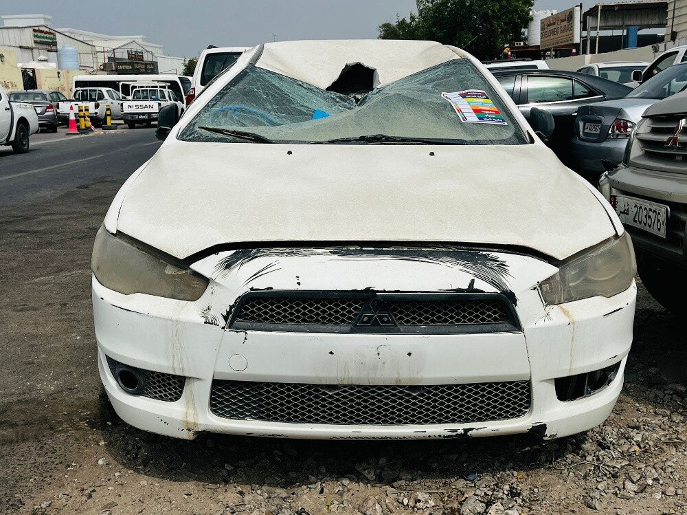 MITSUBISHI LANCER EX 2012 MODEL U — photo 1 for sale in Qatar