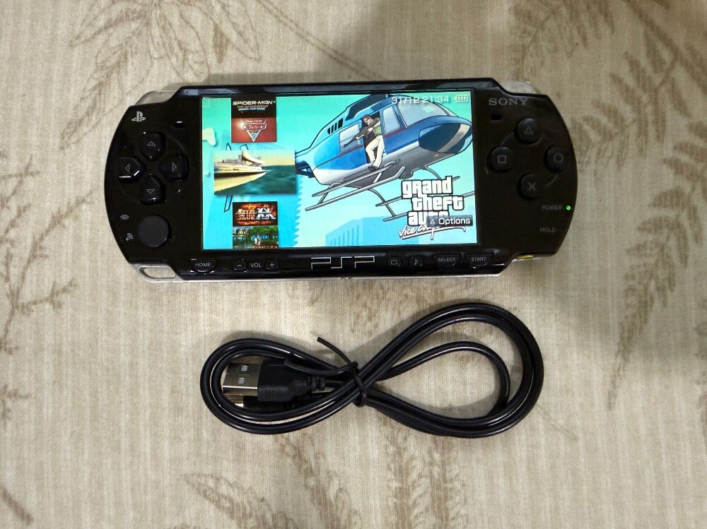 psp with battery and 50 games - 2