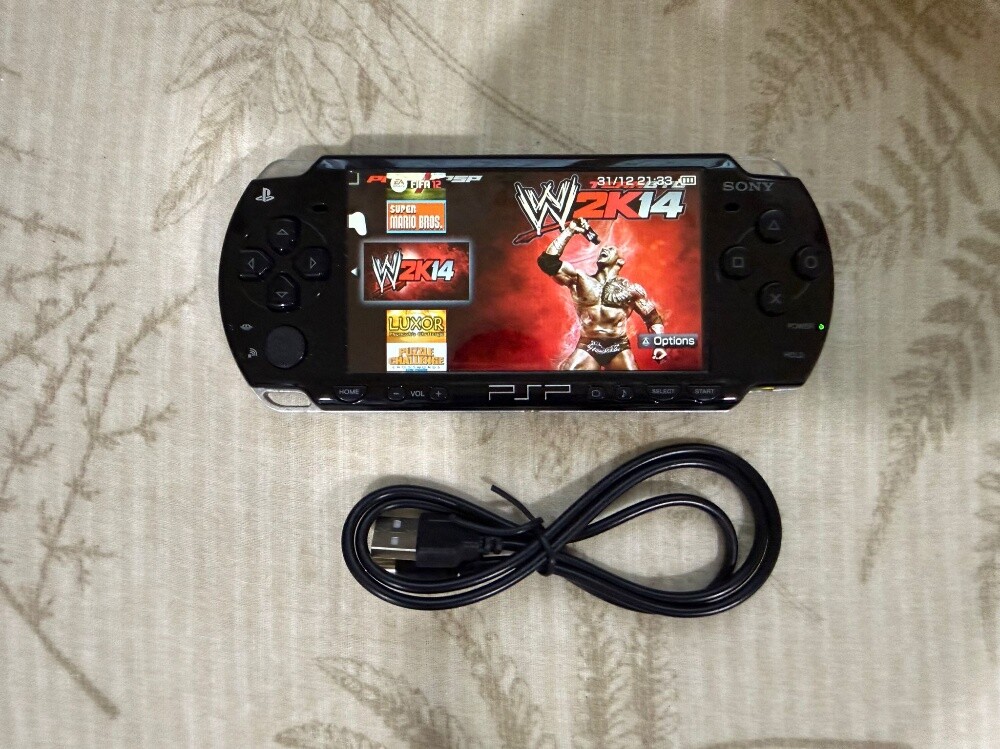 psp with battery and 50 games - 3