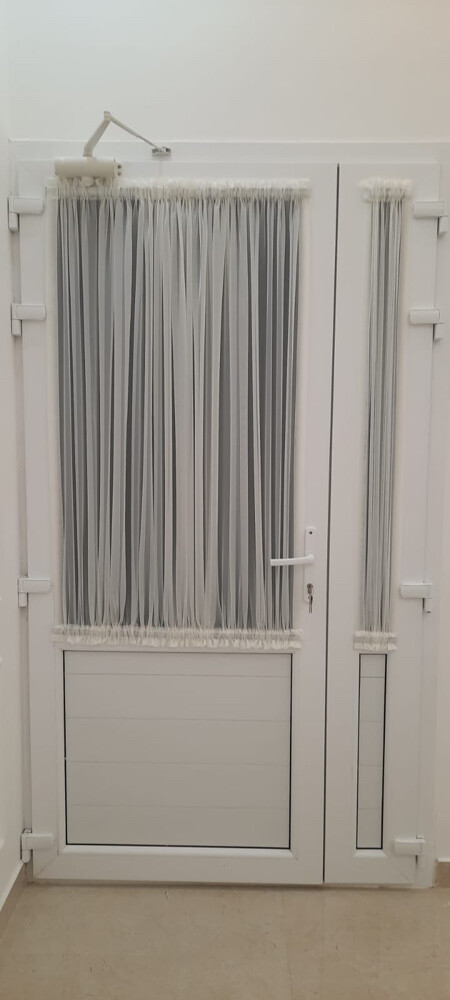 makes new door curtain - 2