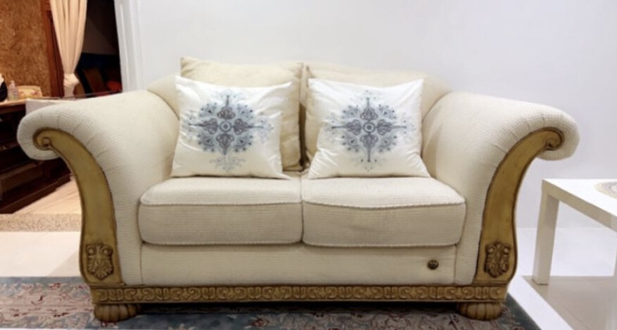white couch set with pillows  - 1