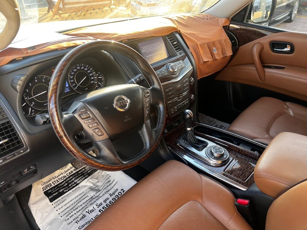 Nissan Patrol Platinum 2014 — photo 8 for sale in Qatar