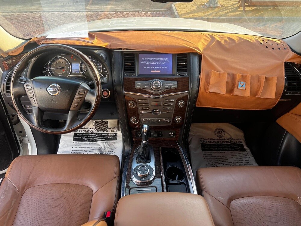 Nissan Patrol Platinum 2014 — photo 10 for sale in Qatar