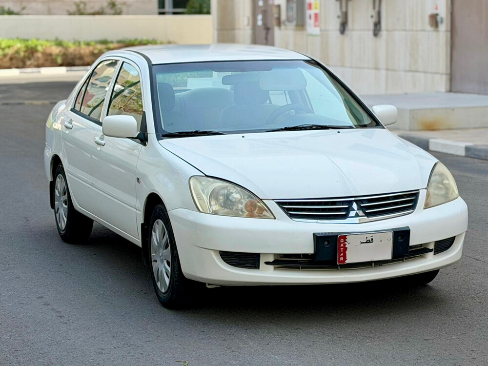 Mitsubishi Lancer 2012 For sale — photo 1 for sale in Qatar