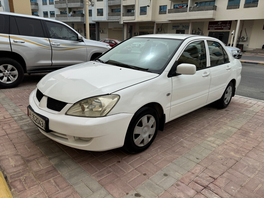 lancer GLS 2009 Family Used — photo 1 for sale in Qatar