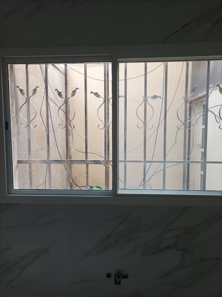 Aluminium & Glass Works. - 10
