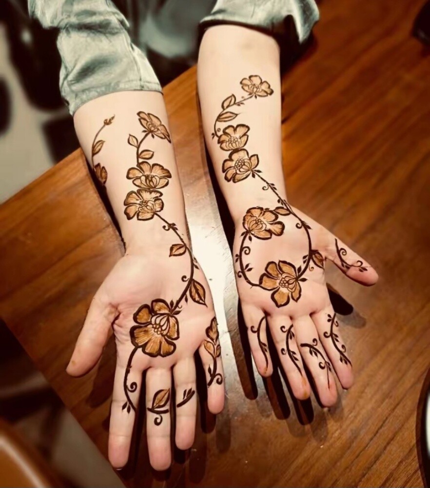 Professional henna artist available - 4