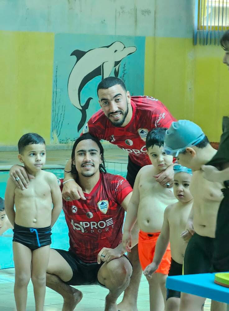 professional swimming coach ‏ - 3