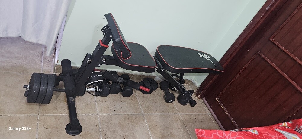 50 kg dumbell bench and bike. - 1